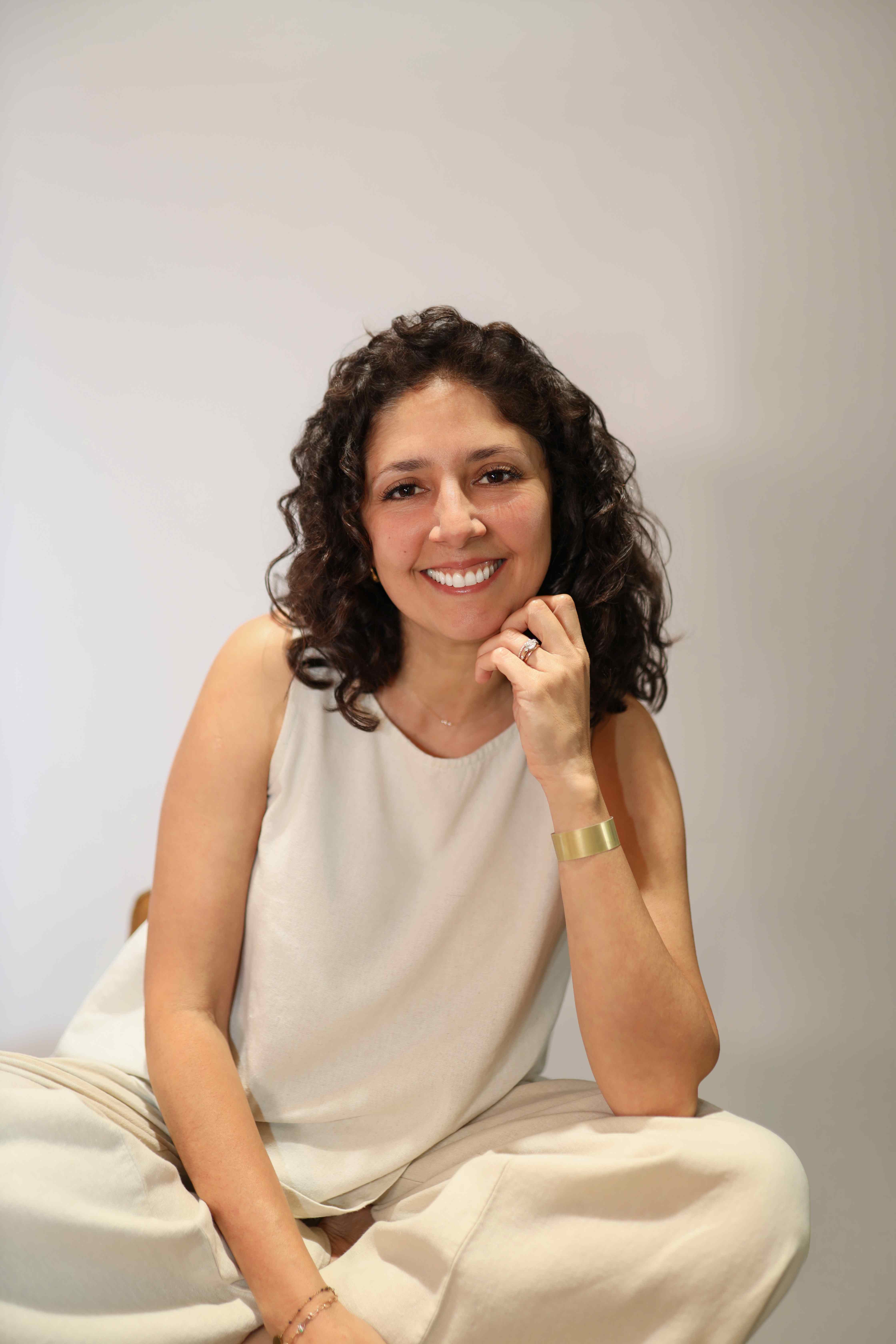 Maribel, Orange County birth doula and photographer, smiling warmly